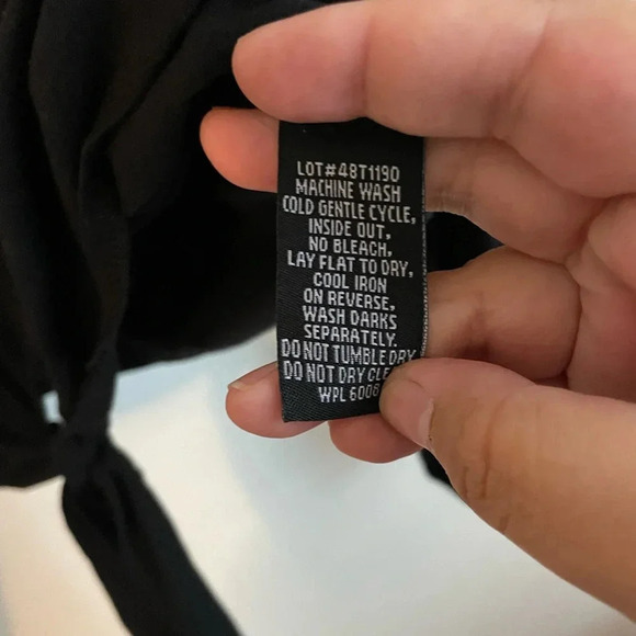 Elegant Black 3/4 Sleeve Blouse with Tie Front and Red Embellishments - Picture 5 of 8